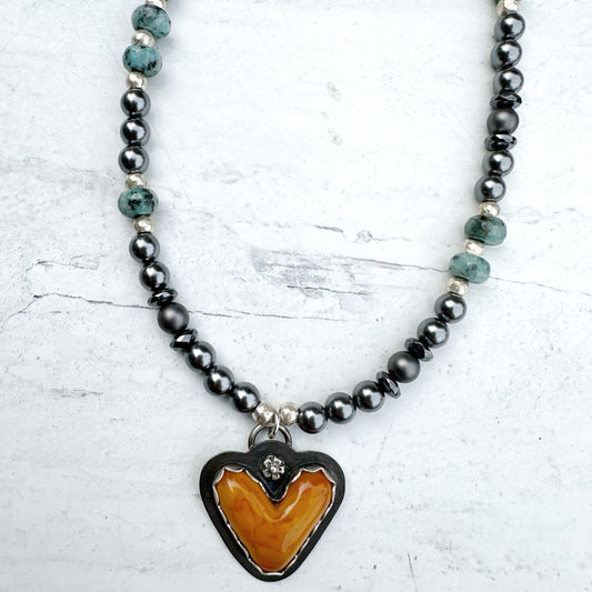 Beaded Boho Necklace with Artisan Heart Charm Glass pearls African Sustainable Metal Gemstones